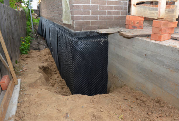 Happy homeowners after waterproofing job in Carson City
